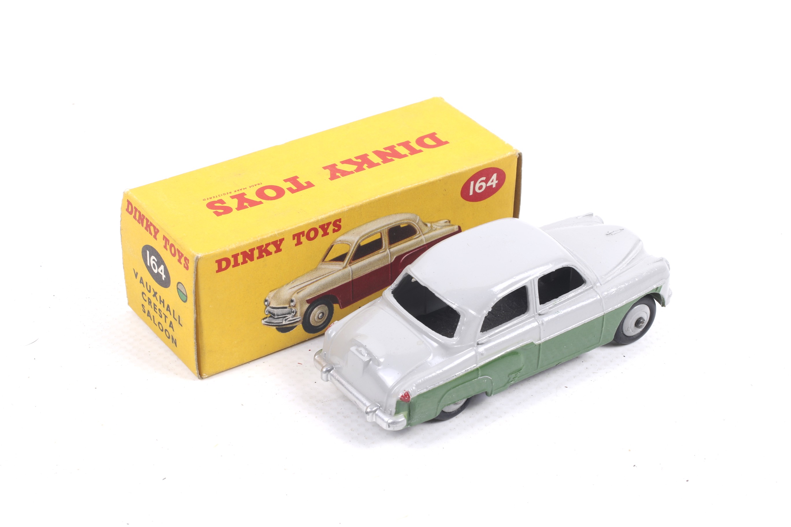 A Dinky diecast Vauxhall Cresta Saloon. No. 164, with two tone grey and green body, in original box. - Image 2 of 2