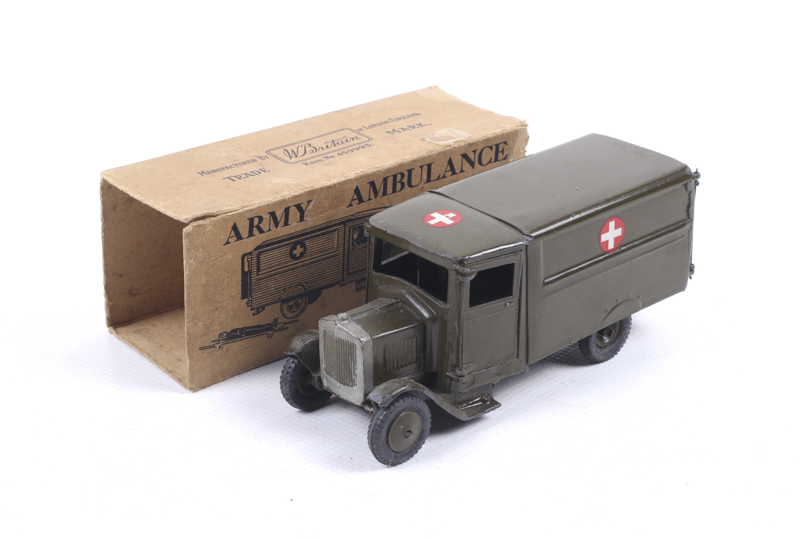 A W Britain diecast military field ambulance. Complete with driver and accessories, in damaged box.