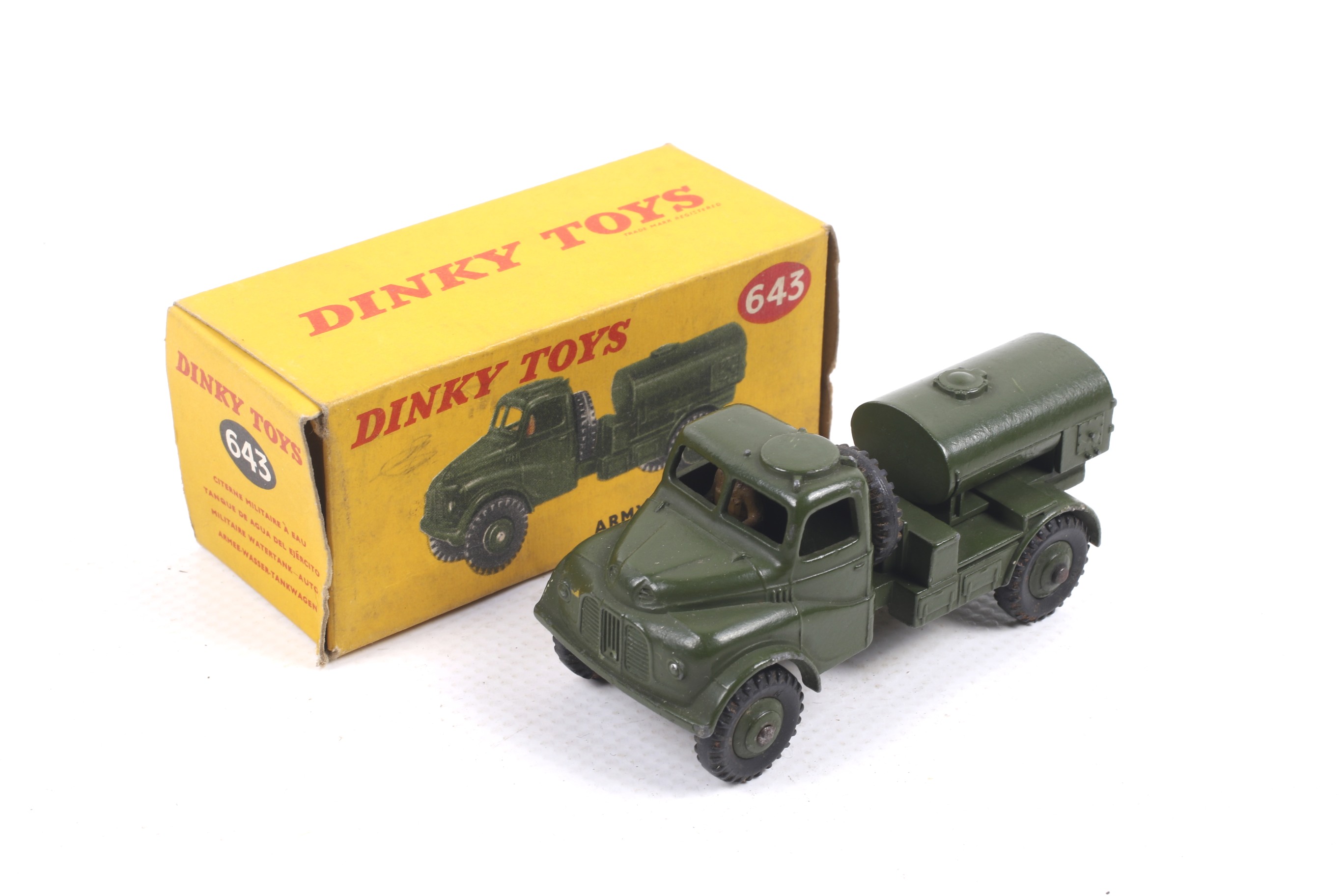 A Dinky diecast army water tanker. No. 643, in green, complete with driver figure, in original box.