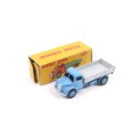 A Dinky diecast Rear Tipping Wagon. No. 414, blue body with grey bed, in original box.