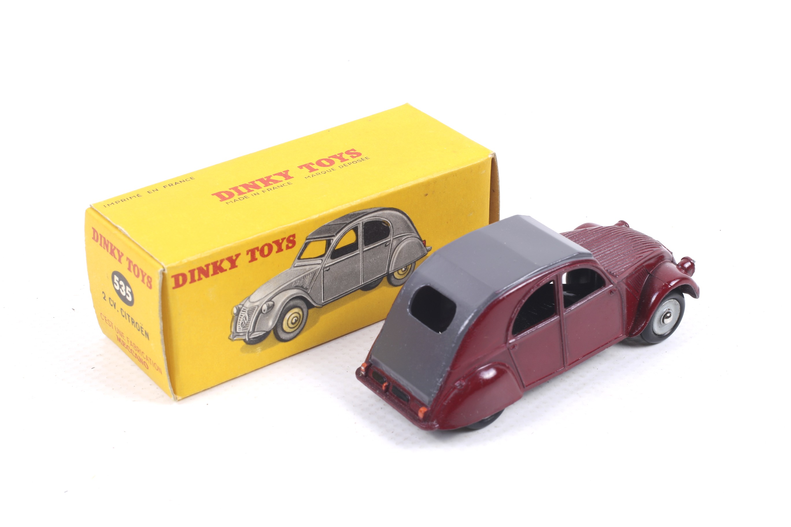 A Dinky diecast Citroen 2CV. No. 535, with red body and grey roof, in original box. - Image 2 of 2