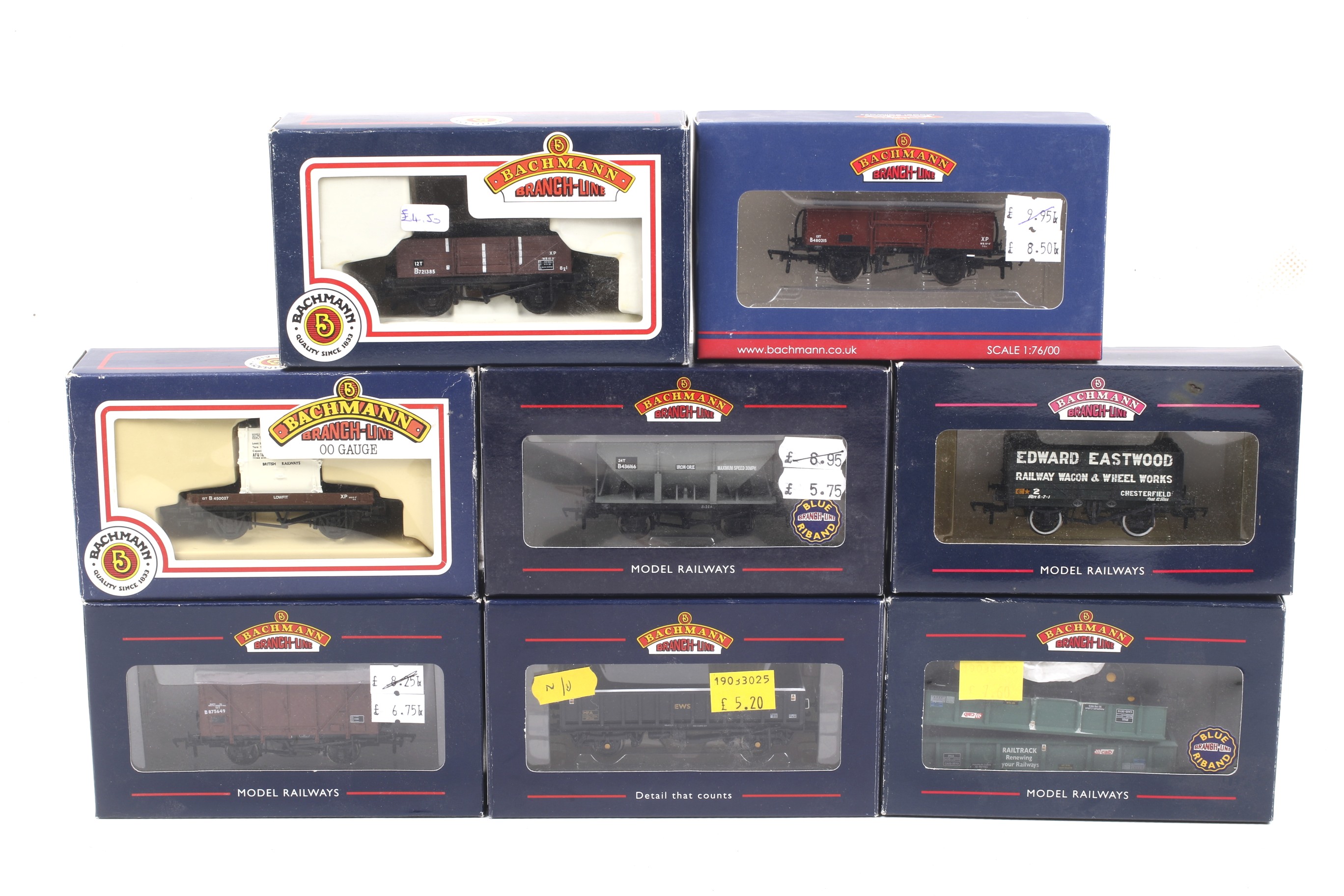 Eight Bachmann OO gauge goods wagons. Featuring ore and mineral wagons etc, all in original boxes.