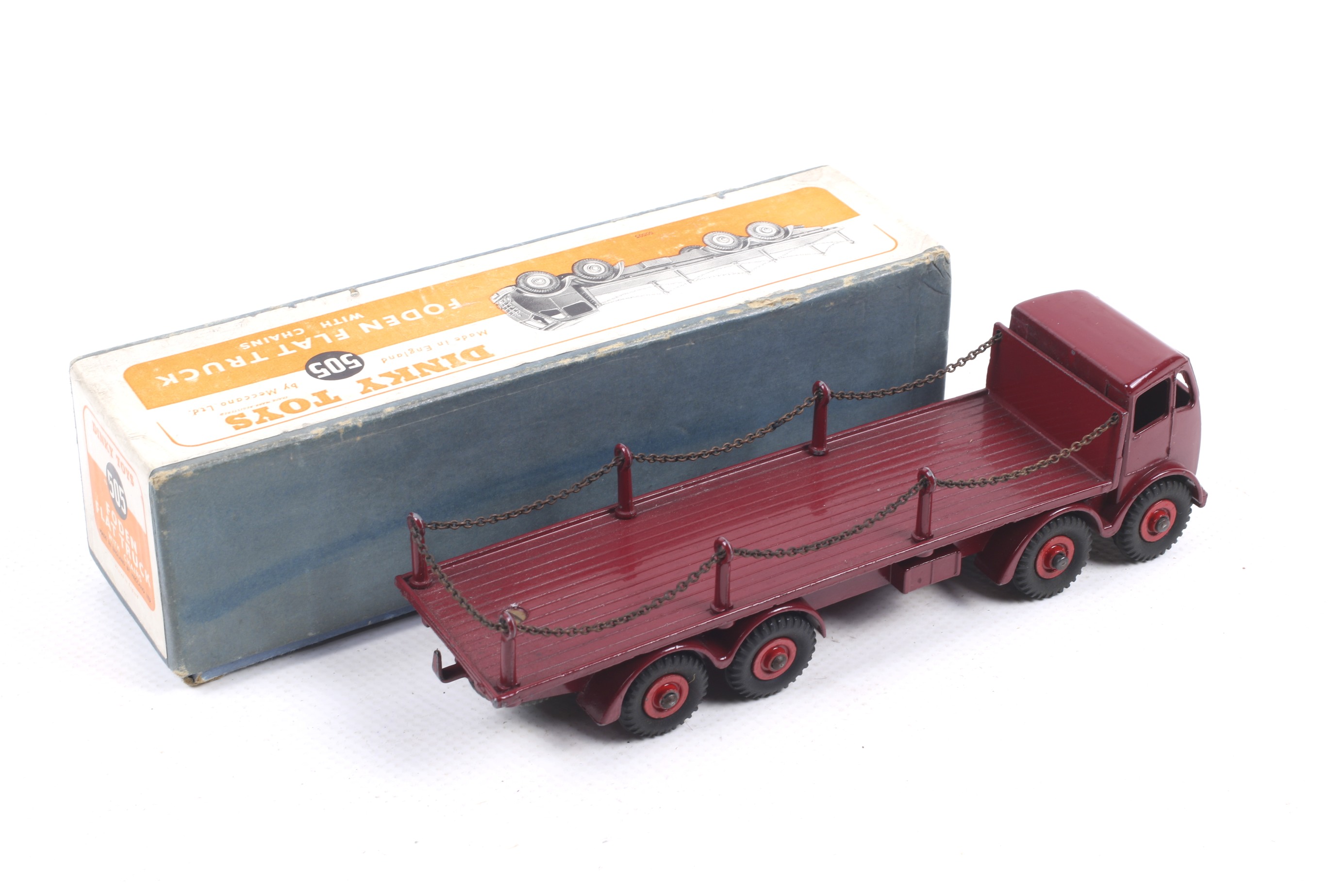 A Dinky diecast Foden Flat Truck. No. 505, red body and wheels with chain, in original box. - Image 2 of 2