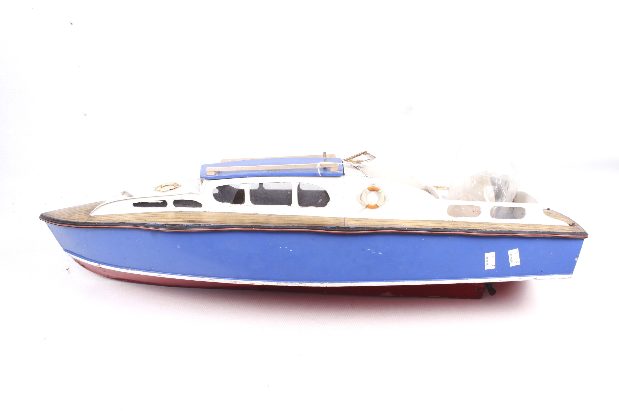 A Scratch built model of a pleasure boat.