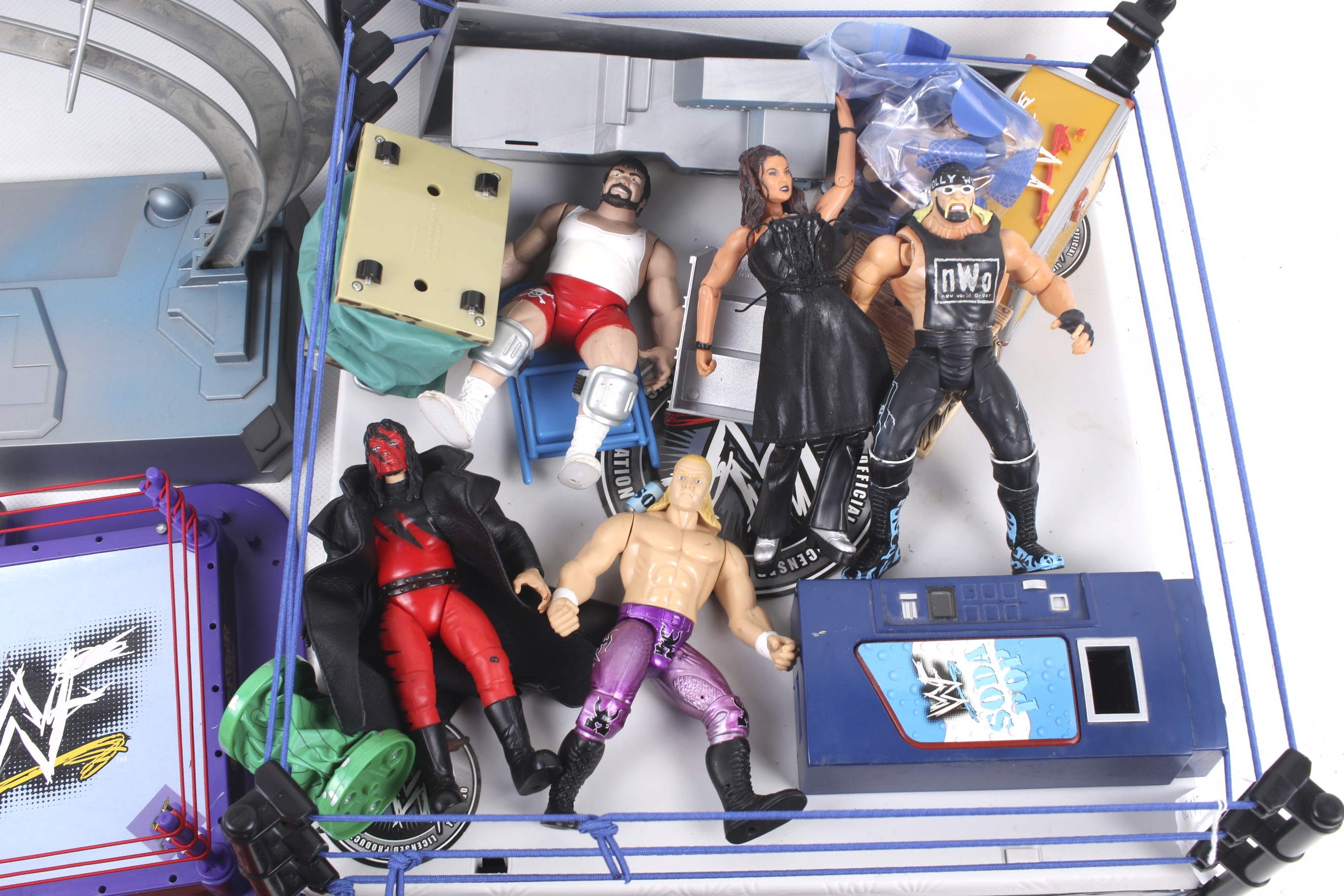 An assortment of WWE Wrestlemania figures and accessories. - Image 2 of 2