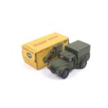 A Dinky diecast army 1 ton cargo truck. No. 641, with green body and black wheels, in original box.