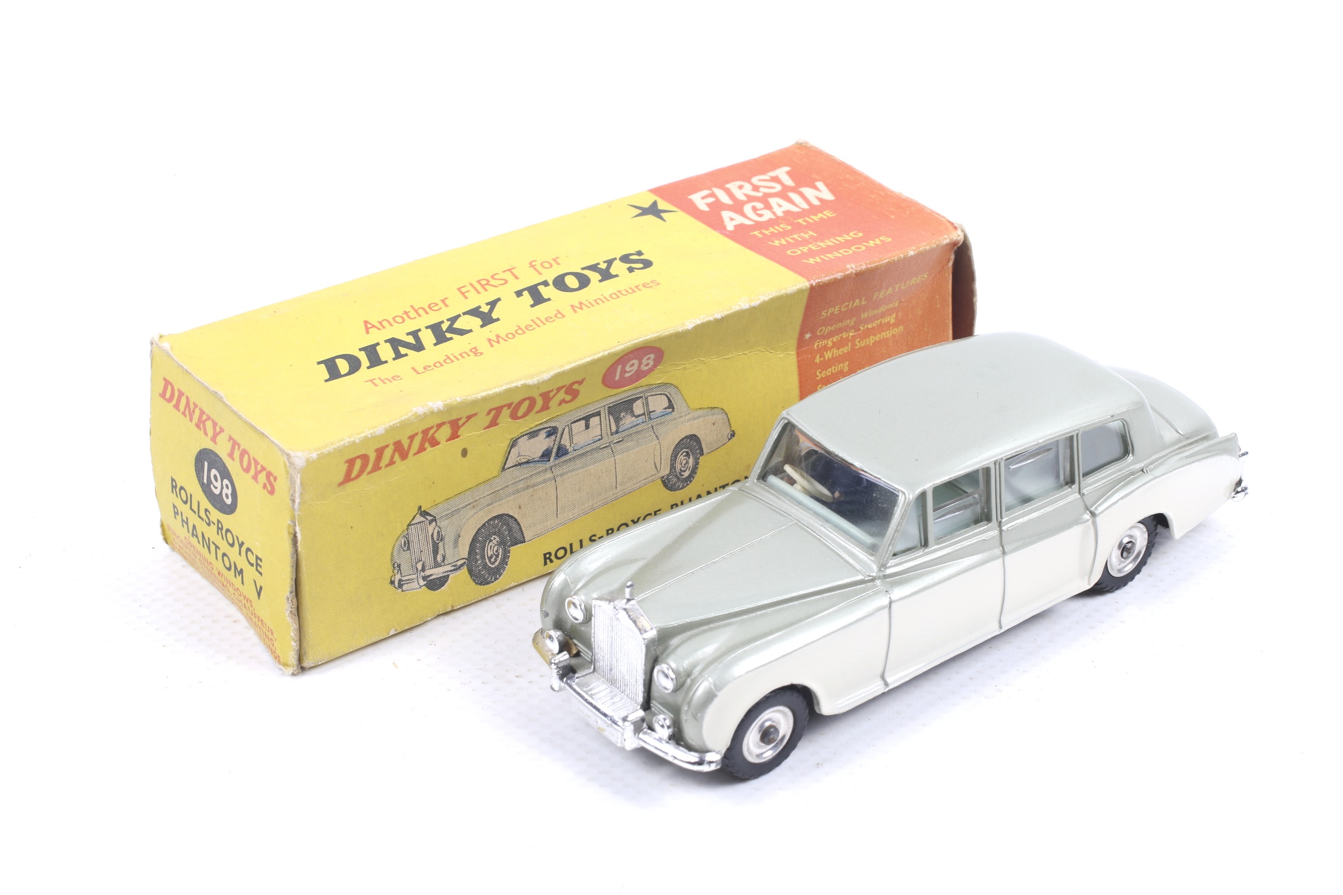 A Dinky diecast Rolls Royce Phantom V. No. 198, with two tone body and chrome trim, in original box.