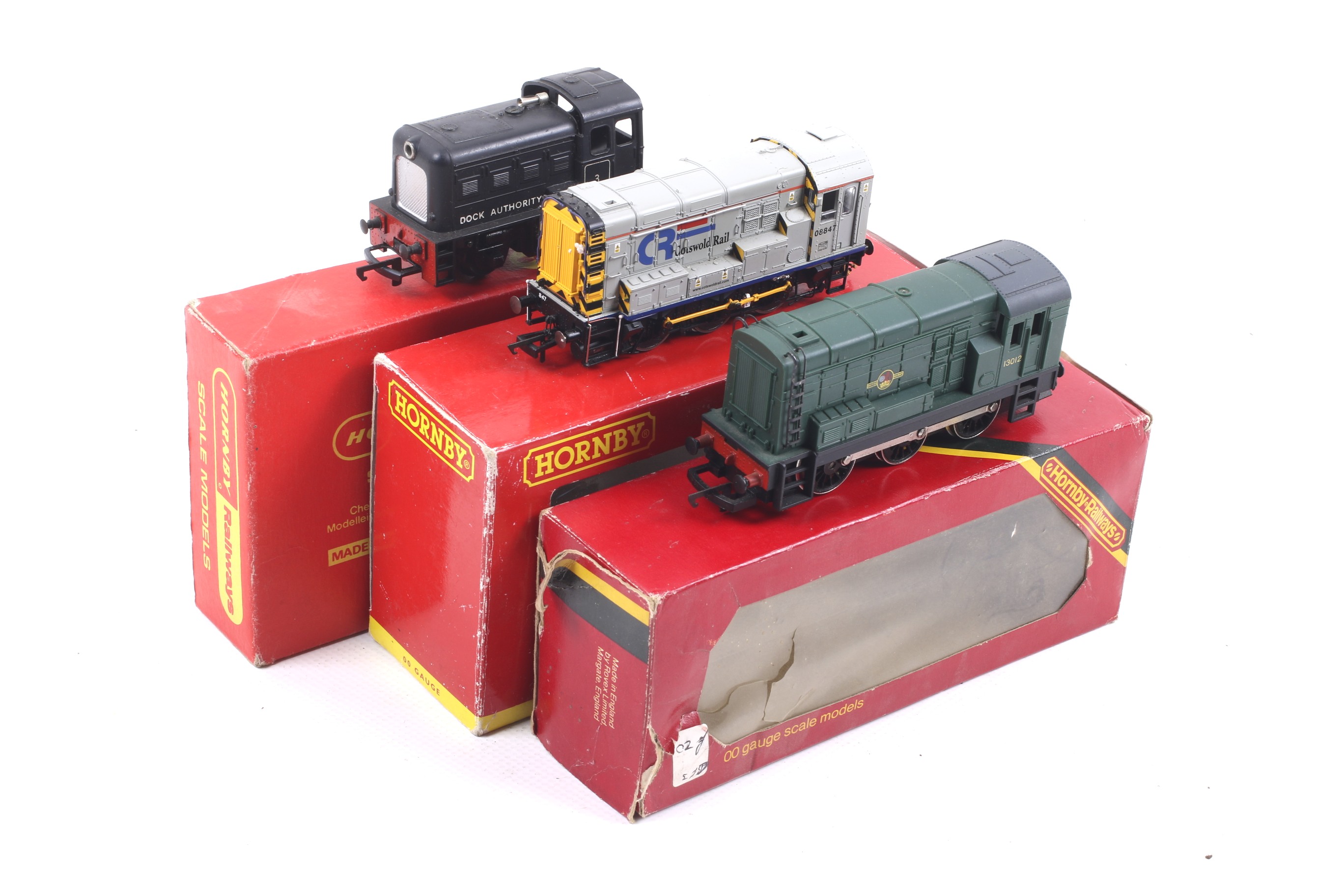 Three Hornby OO gauge diesel shunting engines. Comprising one BR class 08 no.