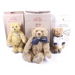 A collection of three Steiff teddy bears.