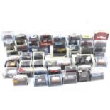 A collection of 1:76 scale diecast vehicles.