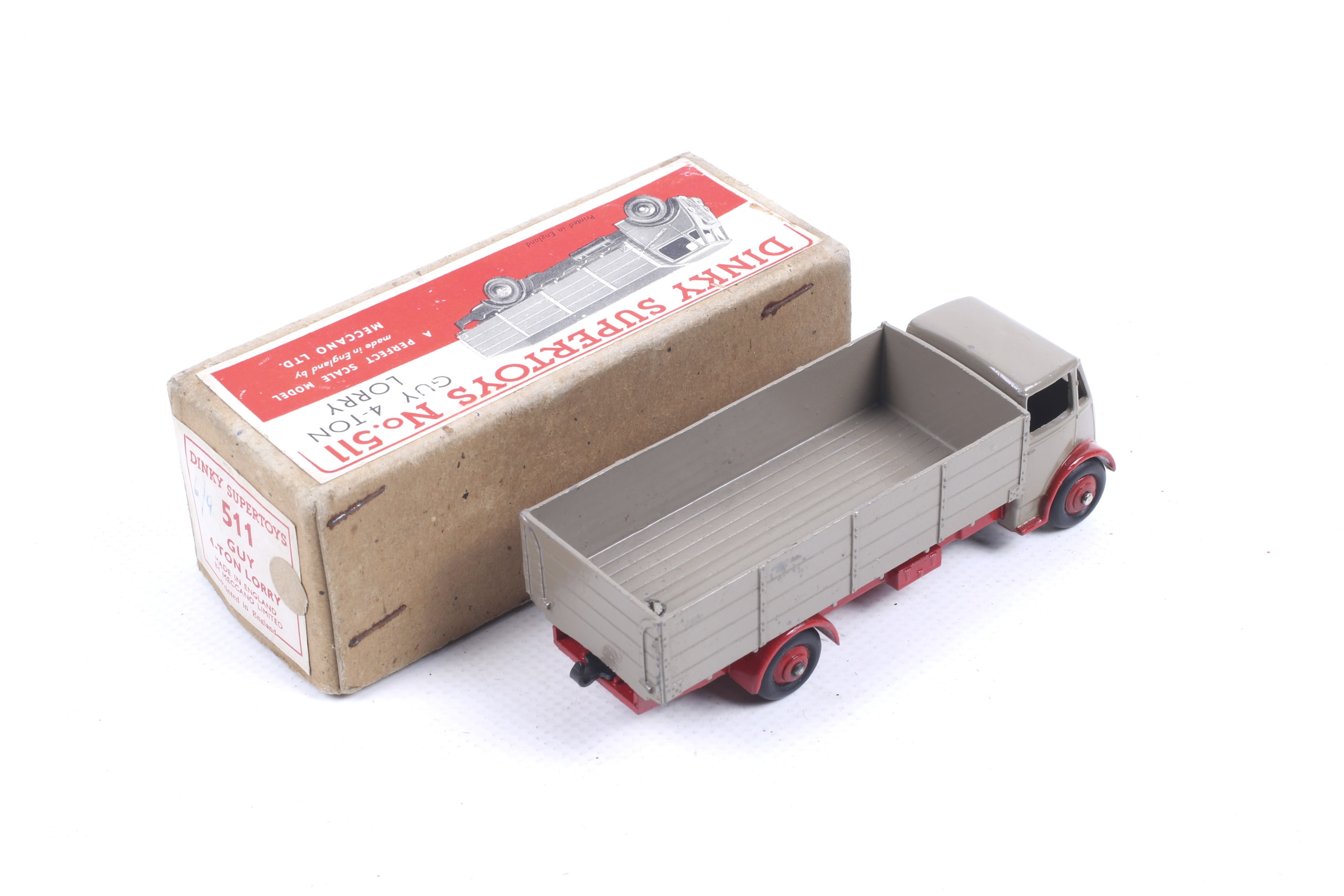 A Dinky diecast Guy 4-Ton lorry. No. 51, red and grey body, in original box. - Image 2 of 2