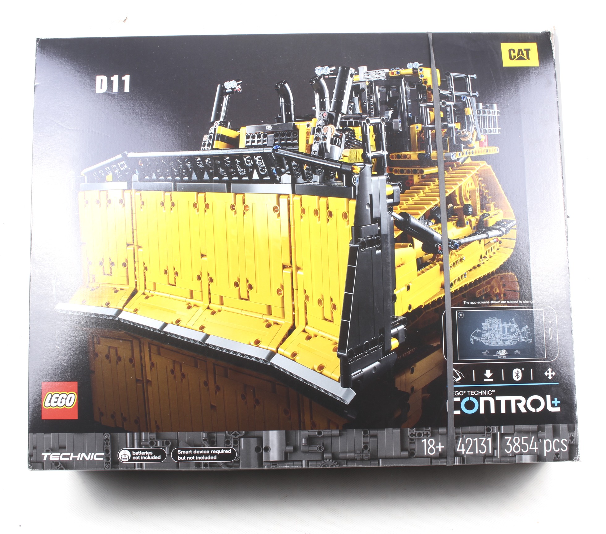 A Lego Technic control Cat bulldozer set. No. D11, in original box, complete according to vendor.