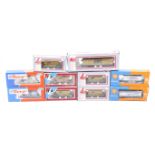 Ten OO gauge goods wagons.