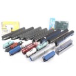 A mixed OO gauge collection of unboxed coaches and wagons. Good range of coaches qty 15.