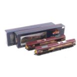 Two Bachmann class 66 OO gauge diesel locomotives. Both in EWS livery nos.