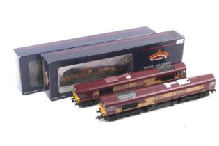 Two Bachmann class 66 OO gauge diesel locomotives. Both in EWS livery nos.