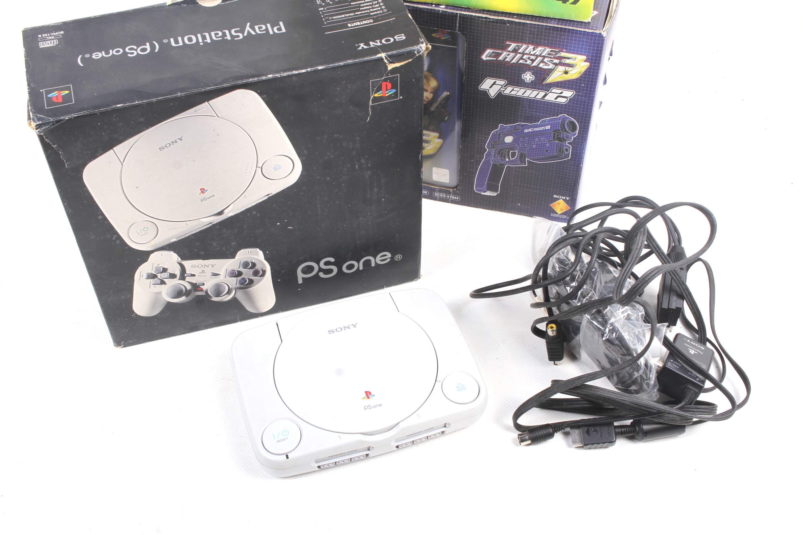 A Sony Playstation One games console and two games. - Image 2 of 2