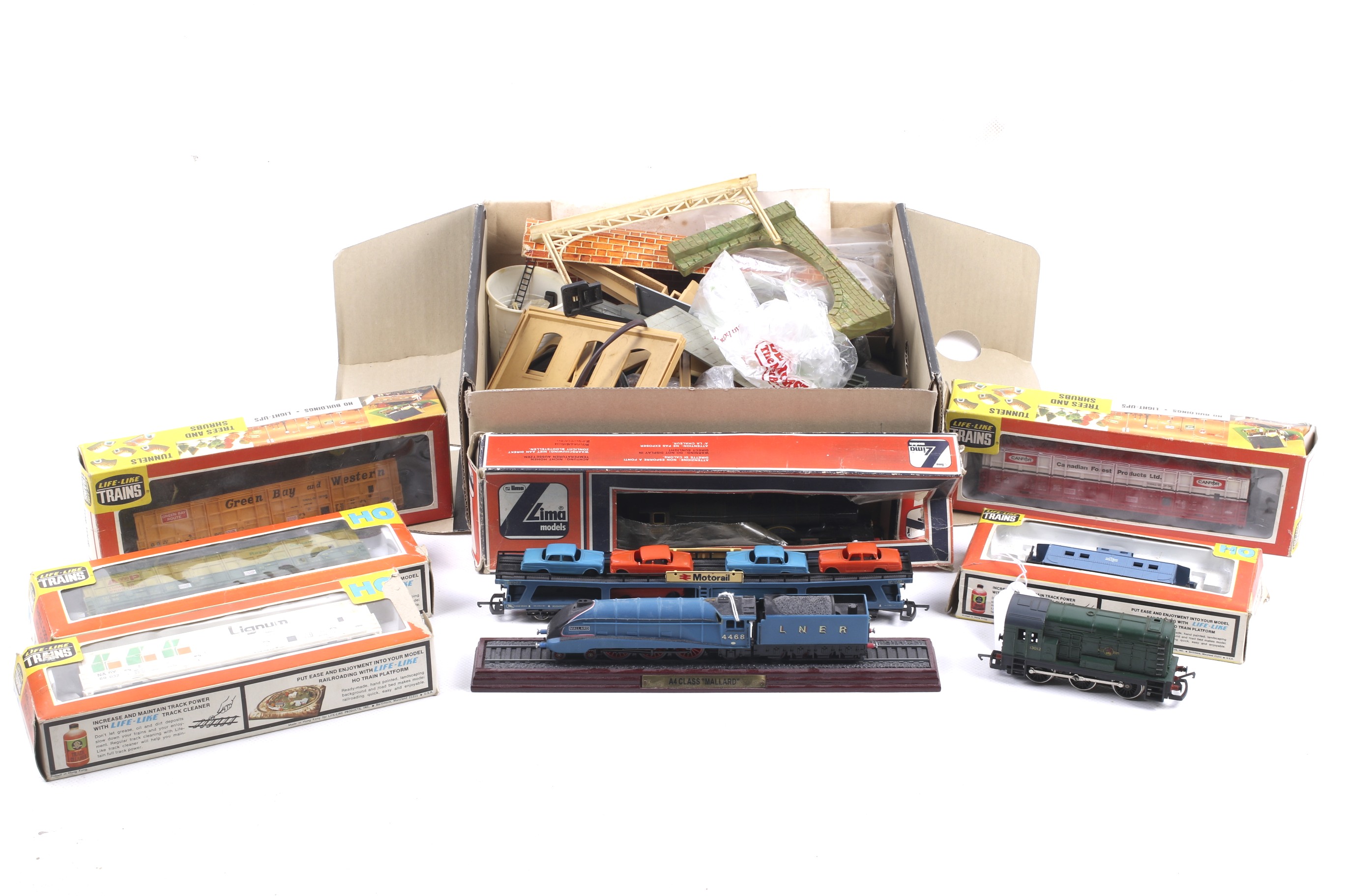 A collection of OO gauge locomotives and accessories.