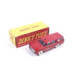 A Dinky diecast Canadian Fire Chiefs Car. No. 257, red body with white wheels, in original box.