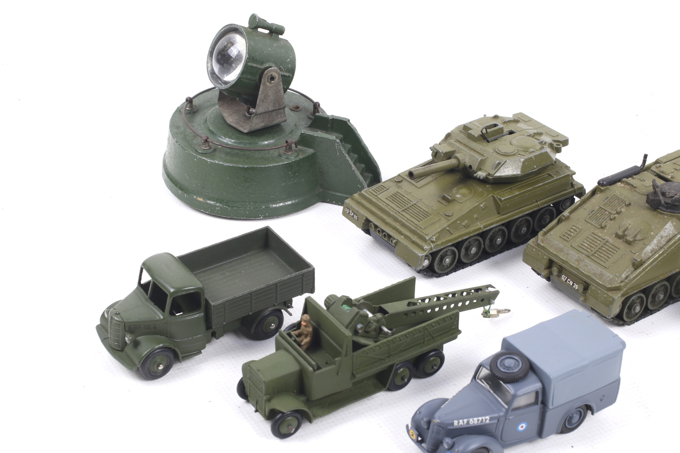 Eight Dinky diecast military vehicles. Including tanks, trucks and a searchlight etc, all unboxed. - Image 2 of 3