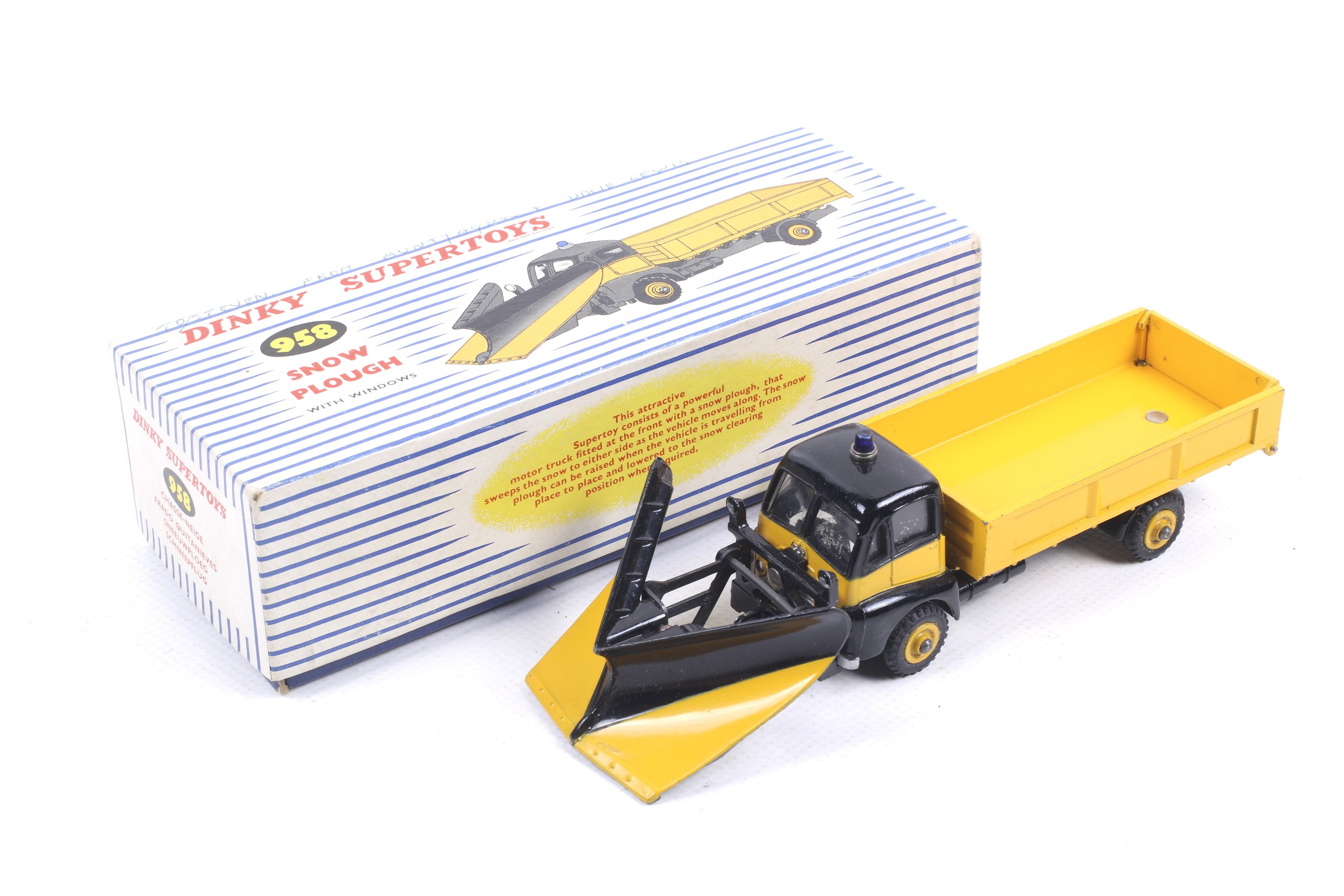 A Dinky diecast Snow Plough. No. 958, yellow body with black trim, in original box.