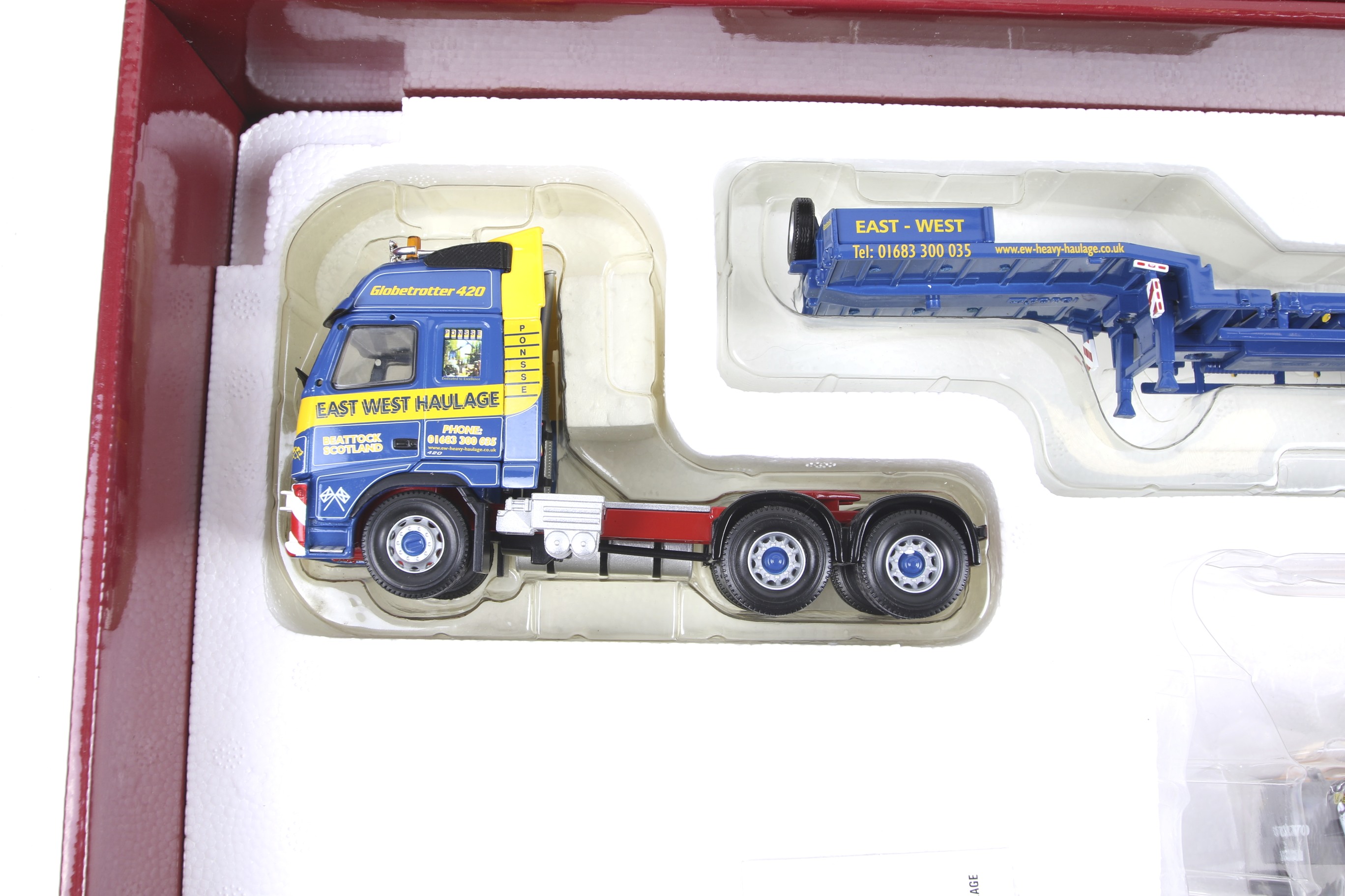 A Corgi Heavy Haulage 1:50 scale diecast Volvo FH Lorry and Trailer with a Volvo Excavator Wheel - Image 2 of 2