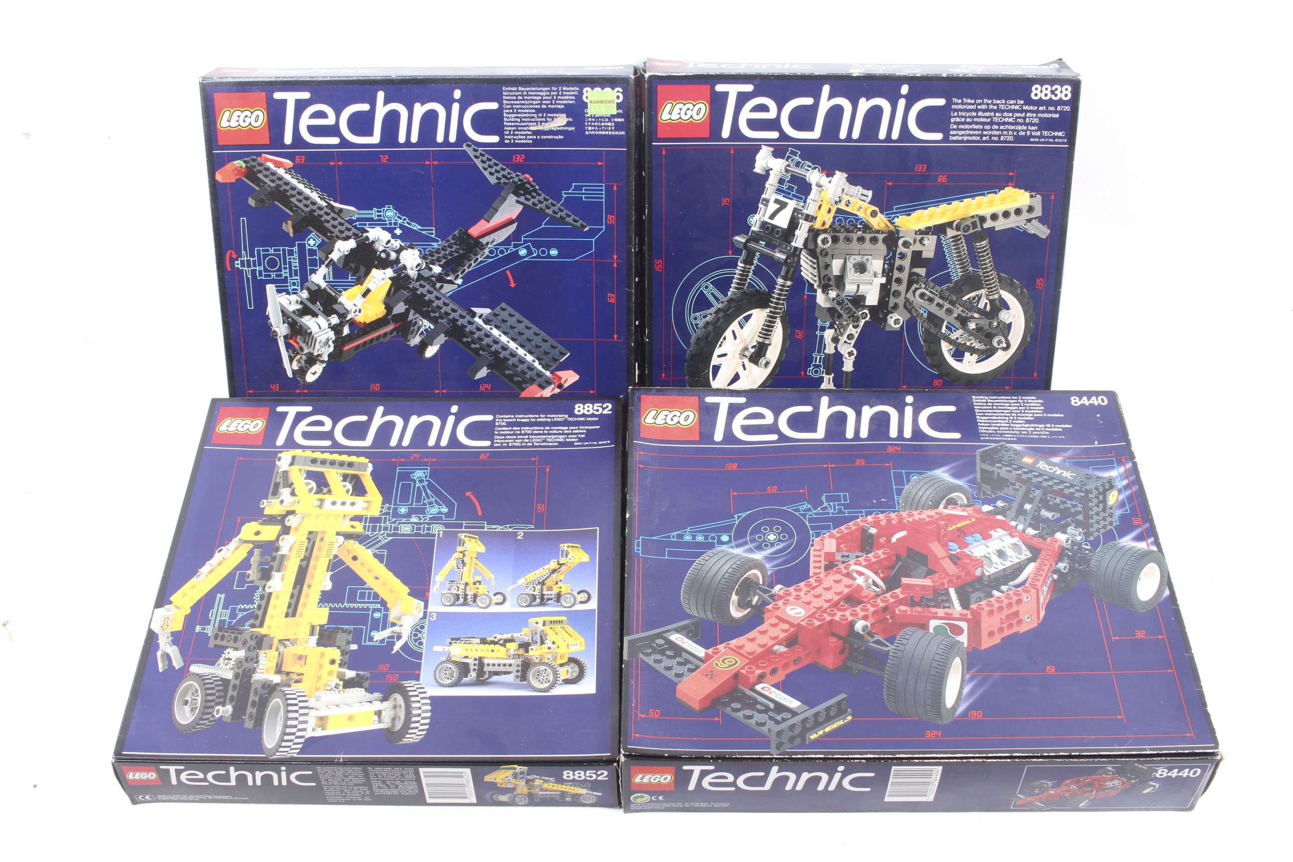 A collection of four Lego Technics sets. Comprising one racing car no.
