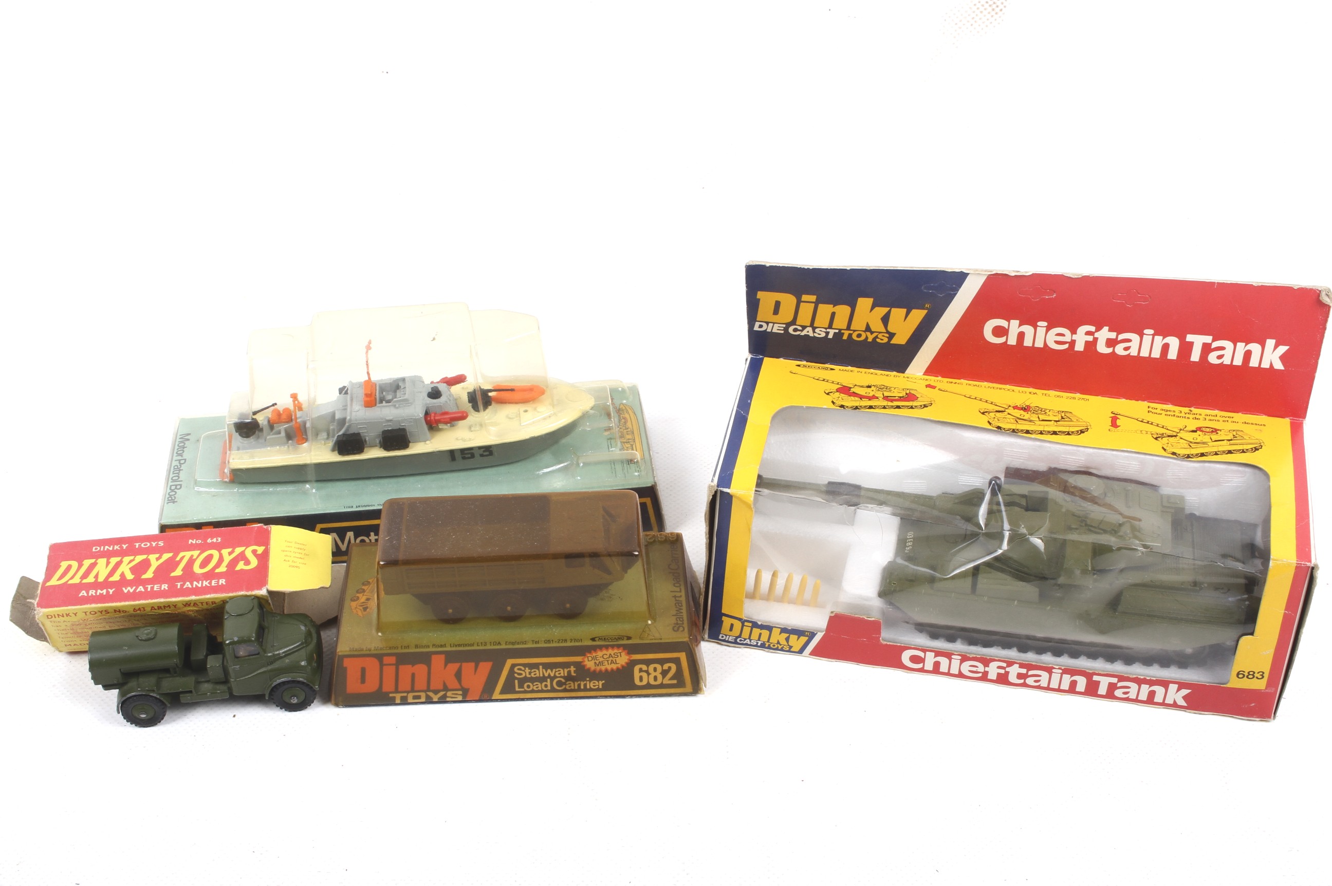 Four boxed Dinky military vehicles. Comprising Motor Patrol Boat no. 675, Stalwart Load Carrier no.