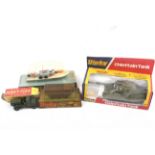 Four boxed Dinky military vehicles. Comprising Motor Patrol Boat no. 675, Stalwart Load Carrier no.