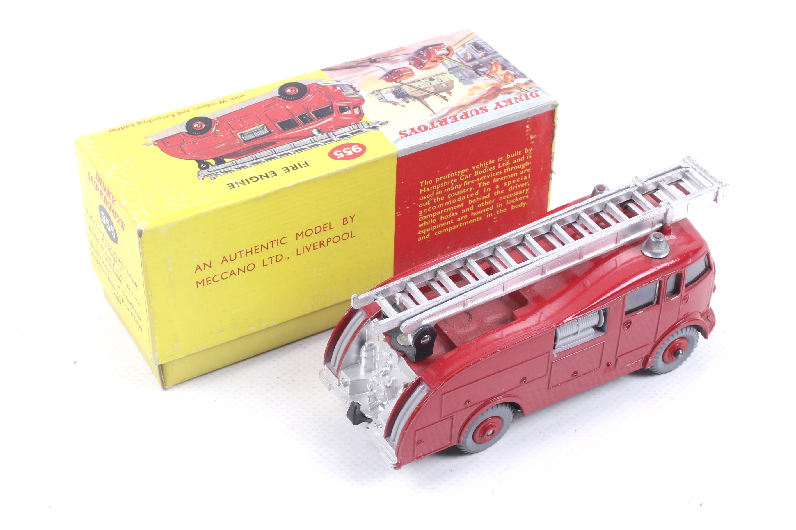 A Dinky diecast Fire Engine. No. 955, red body with chrome trim and ladder, in original box. - Image 2 of 2