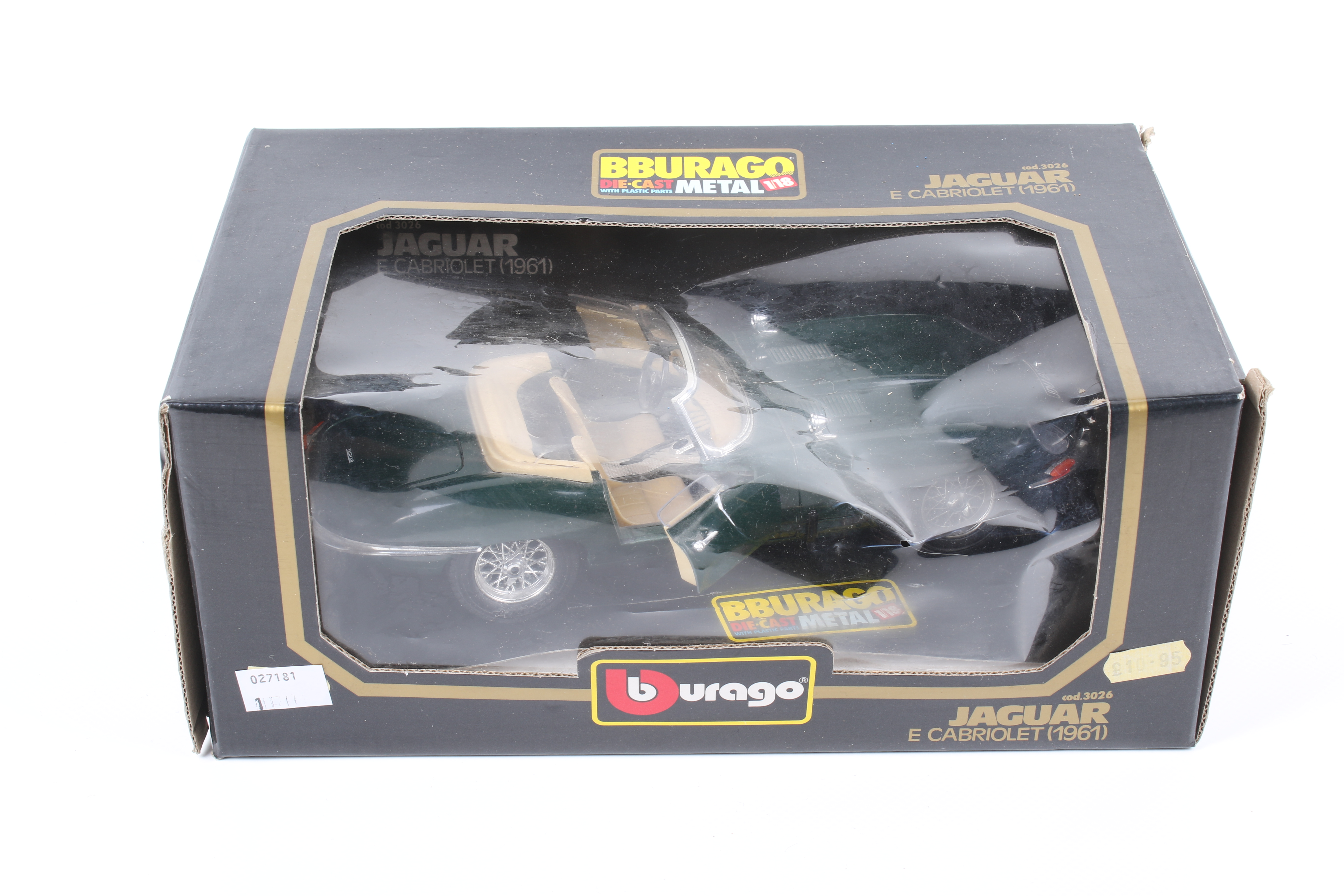 A Burago 1961 Jaguar E Cabriollet 1961. In green with cream interior, in original box.