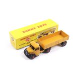 A Dinky diecast Bedford Articulated Lorry. No. 409, yellow body with black trim, in original box.
