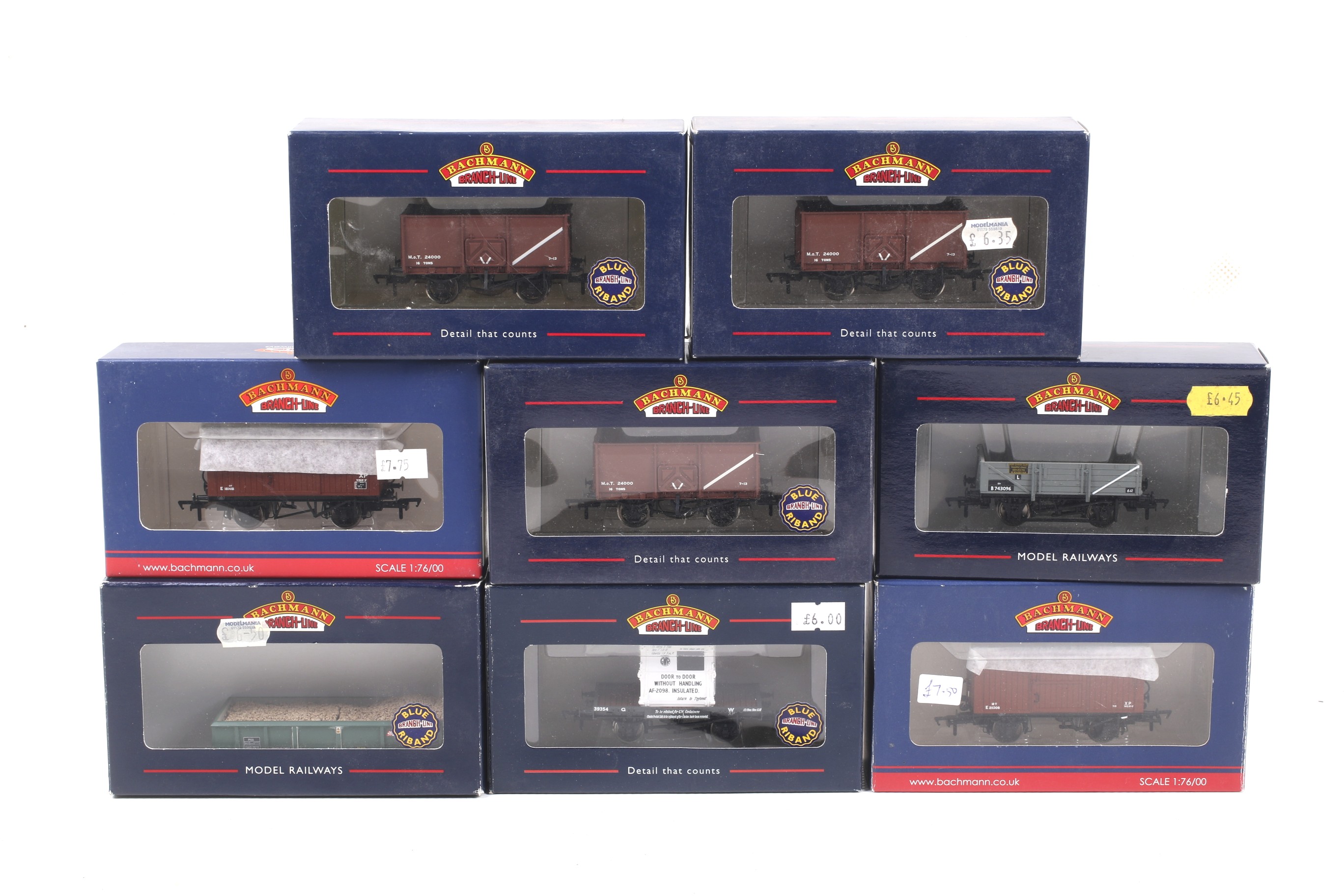 Eight Bachmann OO gauge goods wagons.