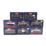 Eight Bachmann OO gauge goods wagons.