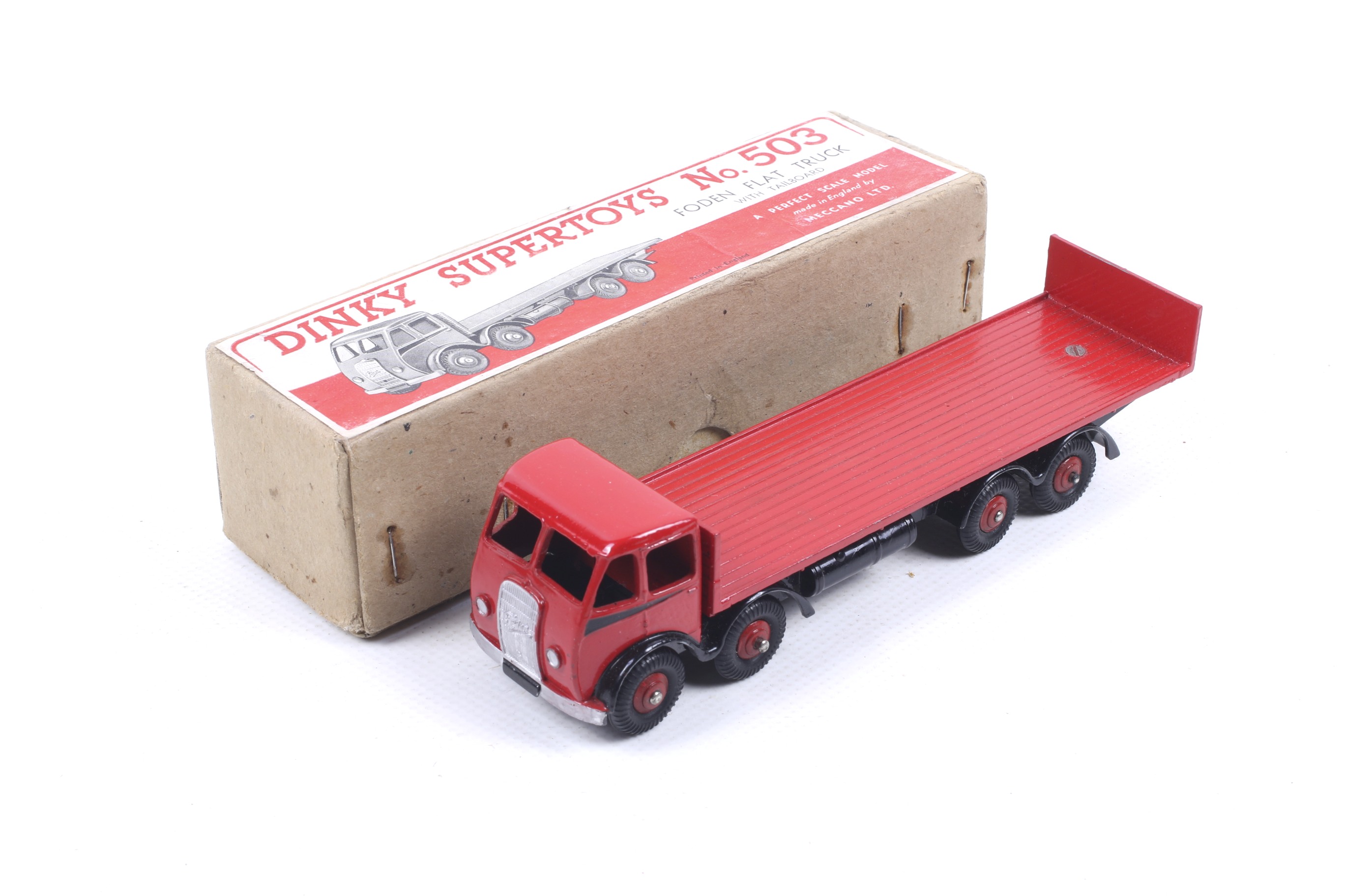 A Dinky diecast Foden Flat Truck. No. 503 (first type), with red body and trailer, in original box.