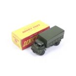 A Dinky diecast 3 ton Army Wagon. No. 621, green body complete with driver, in original box.