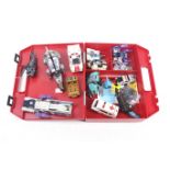 A vintage Transformers Organiser red plastic carry case and contents.