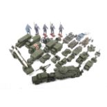 A collection of diecast metal military vehicles and accessories.