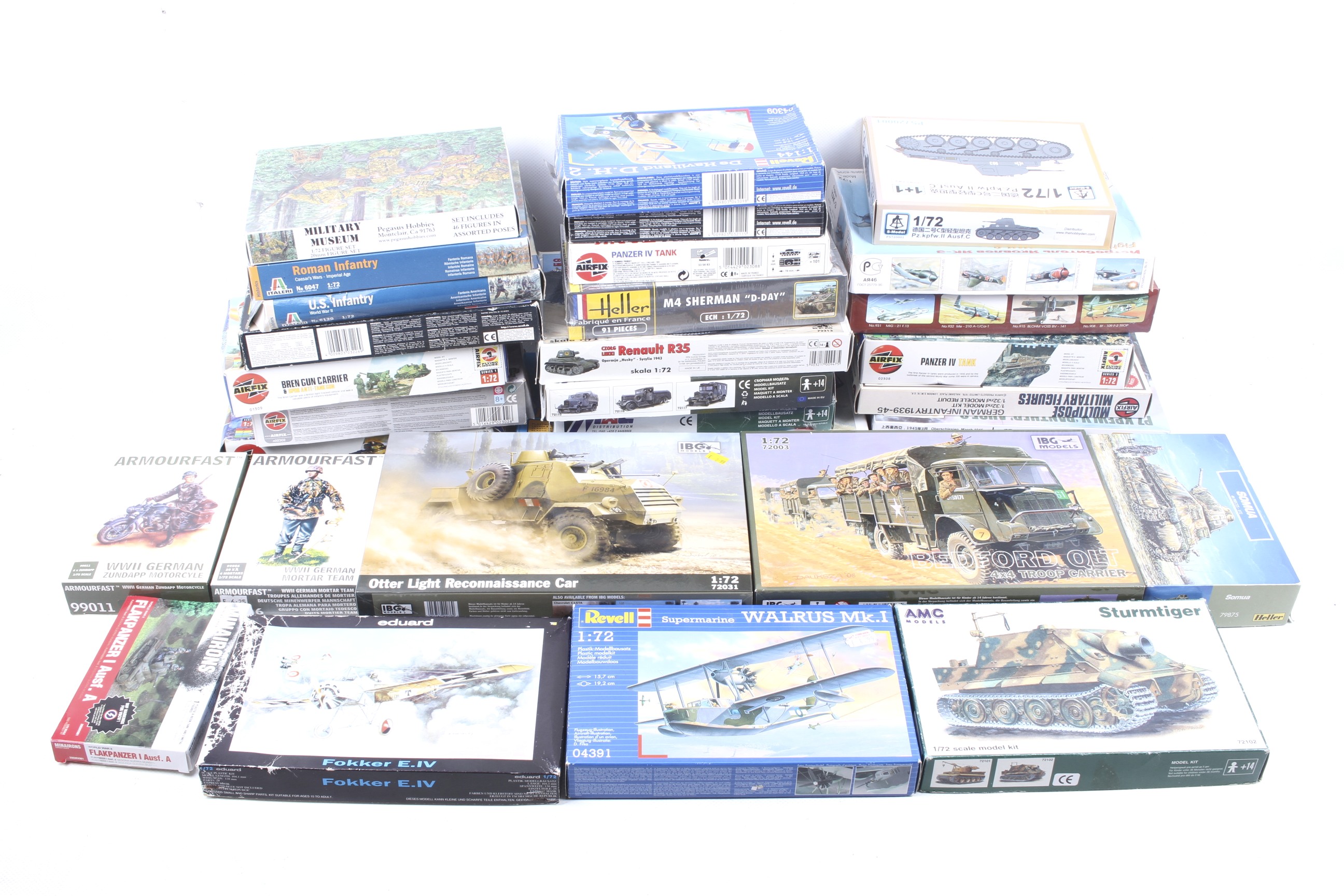 An assortment of mainly military related model kits.