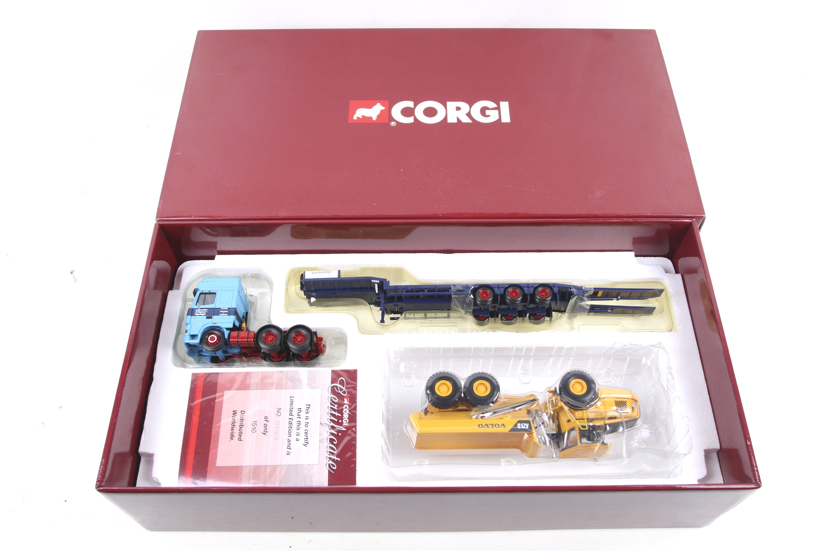 A Corgi Heavy Haulage 1:50 scale diecast DAF XF lorry and Trailer with a Volvo A25D Articulated