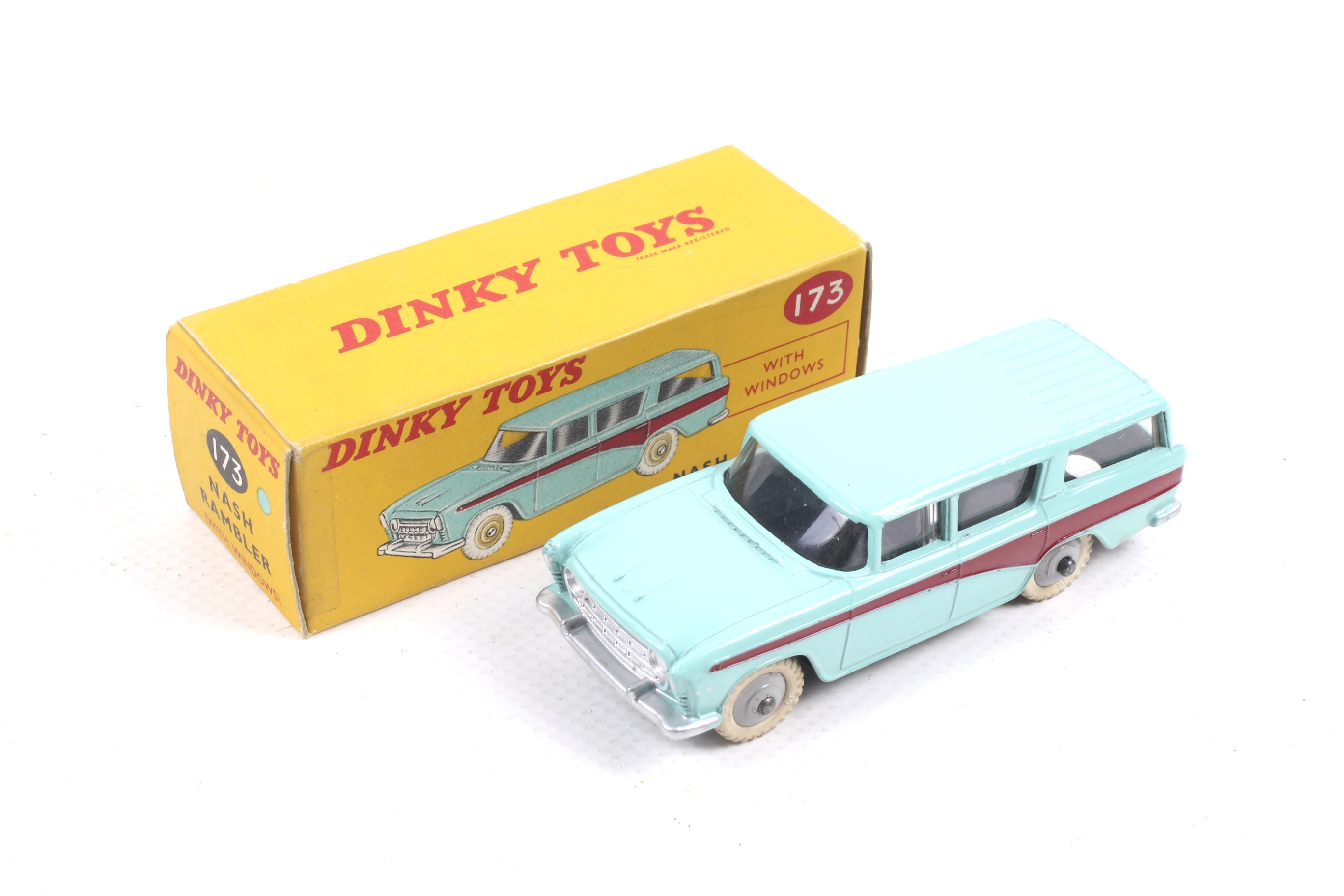 A Dinky diecast Nash Rambler. No. 173, with blue body and red trim, in original box.