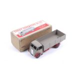A Dinky diecast Guy 4-Ton lorry. No. 51, red and grey body, in original box.