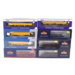 Eight OO gauge goods wagons.