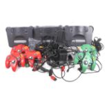 Three Nintendo 64 consoles and accessories.