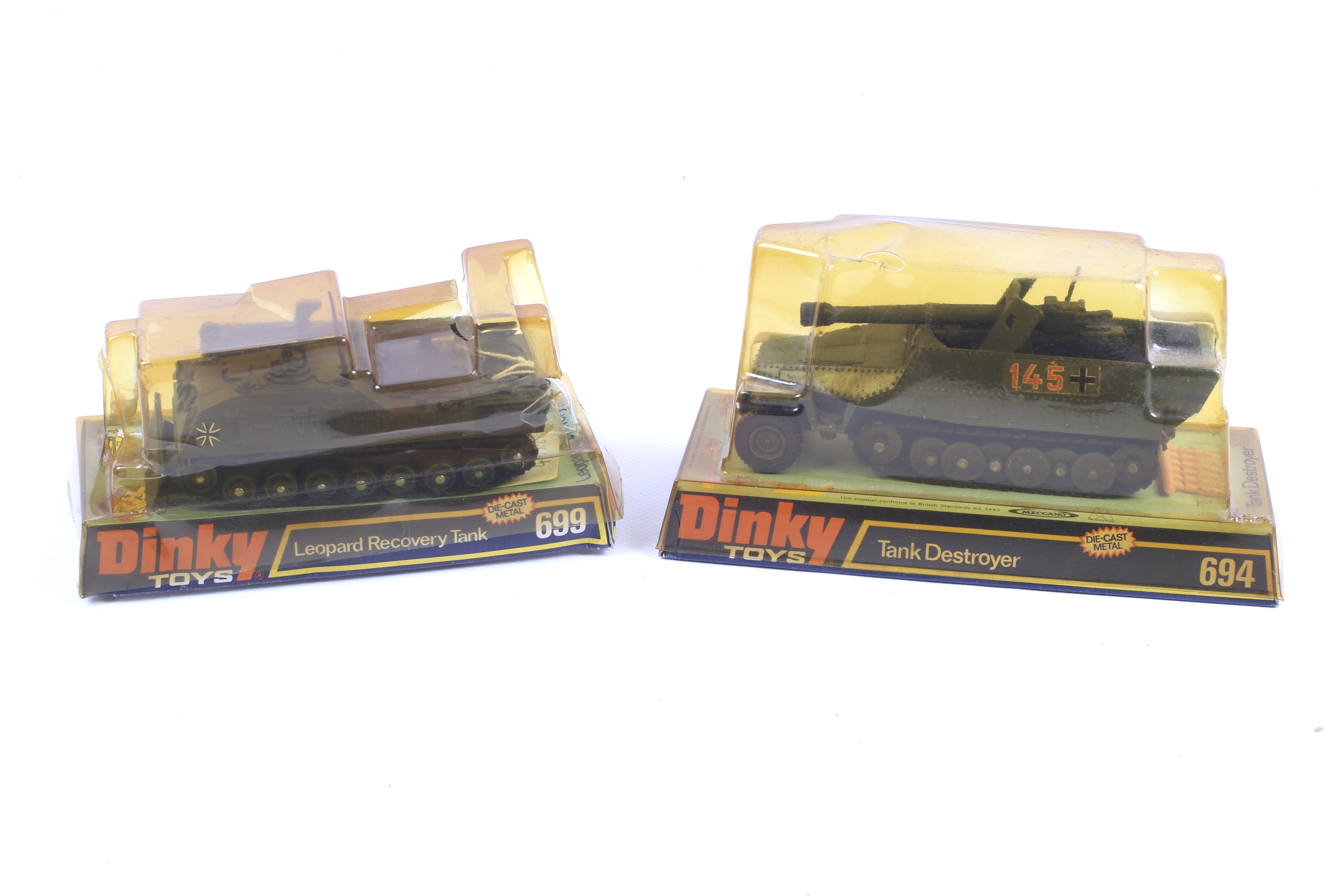 Two Dinky military vehicles. Comprising one Leopard Recovery Tank no. 699 and one Tank Destroyer no.