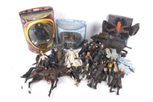 A collection of Lord of the Rings action figures.