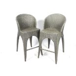 A pair of contemporary 'wicker' style garden bar stools.