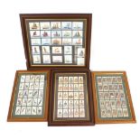 A collection of framed cigarette cards.