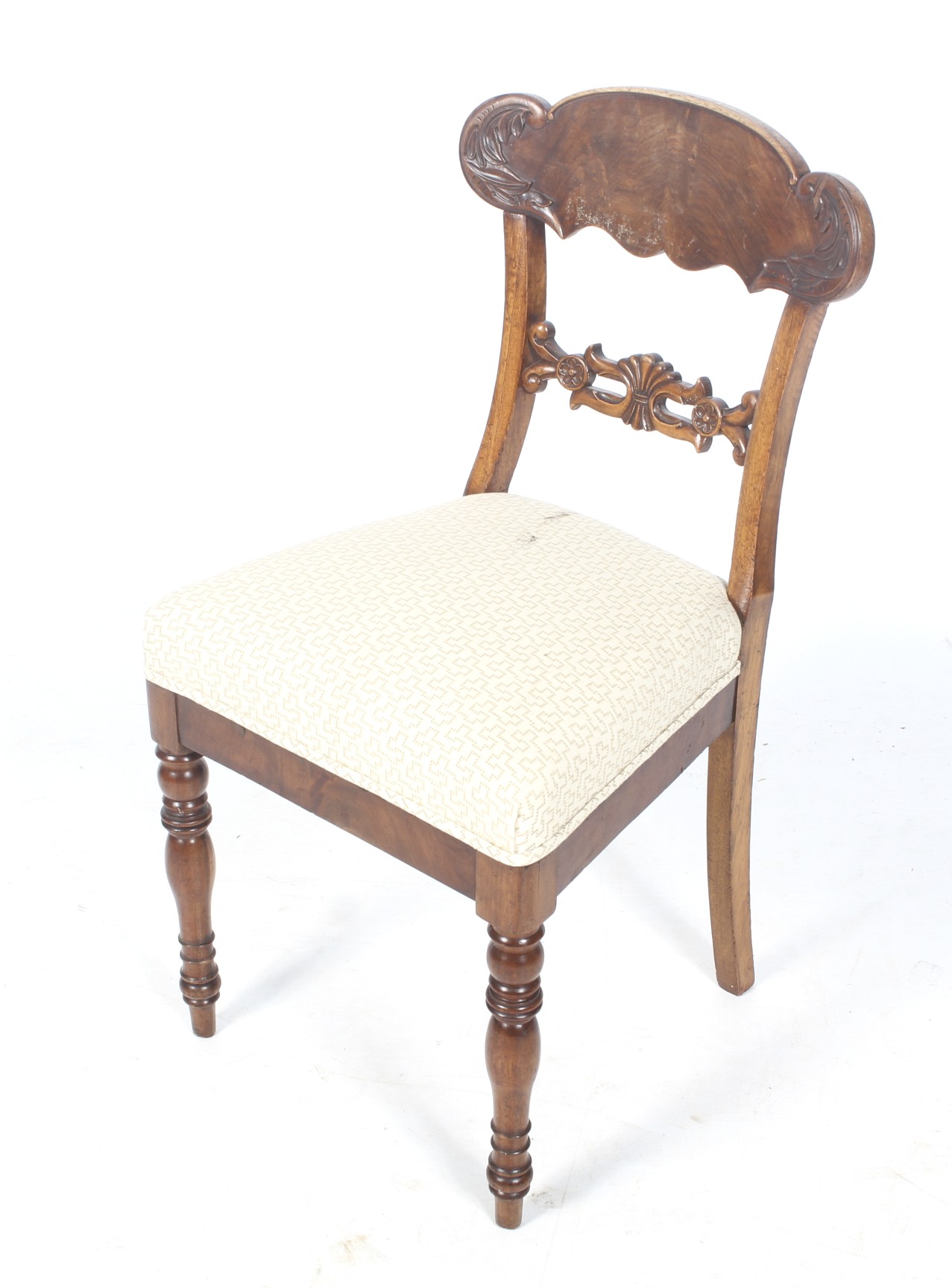 A 19th century carved bar-back mahogany chair.
