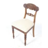 A 19th century carved bar-back mahogany chair.